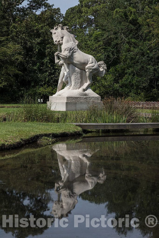 Photograph- Anna Hyatt Huntington's limestone sculpture,"Youth Taming the Wild," at Brookgreen Gardens, a vast complex of sculpture gardens, ecosystem trails, a wildlife preserve and a small