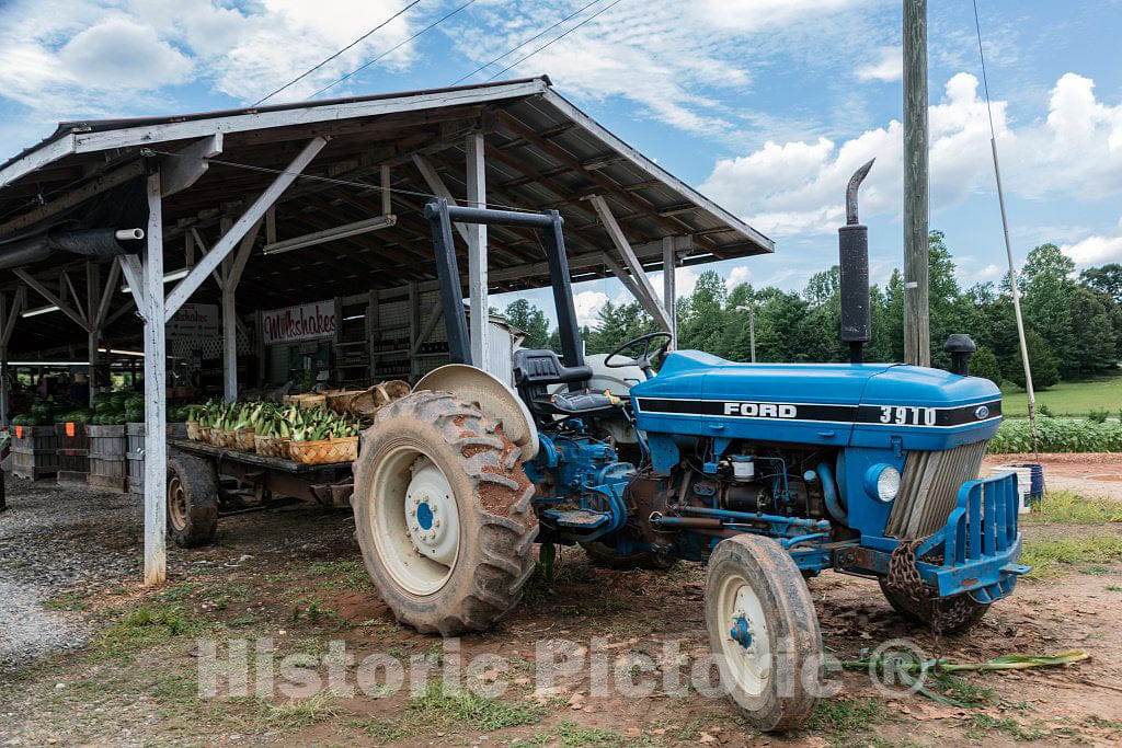 Photo - This Tractor gets Plenty of Work preparing The Land for Crops Sold at Fritchey's Farm Market Outside Aerial, Georgia- Fine Art Photo Reporduction