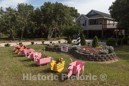 Photo - Colorful garden ornaments at a house in Duck, a community named for the plethora of waterfowl in the area, in North Carolina's Outer Banks- Fine Art Photo Reporduction