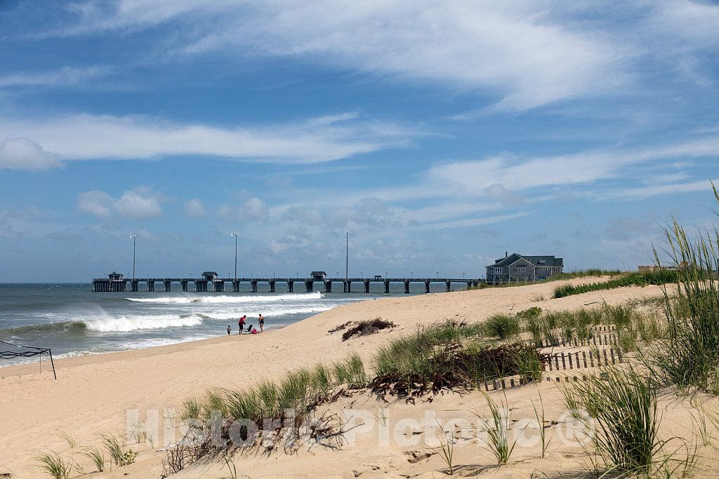 Photograph - Jennette's Pier in Nags Head, a community on North Carolina's Outer Banks, a 200-mile-long string of barrier islands and splits off the coast that locals like to call the"OBX" 2