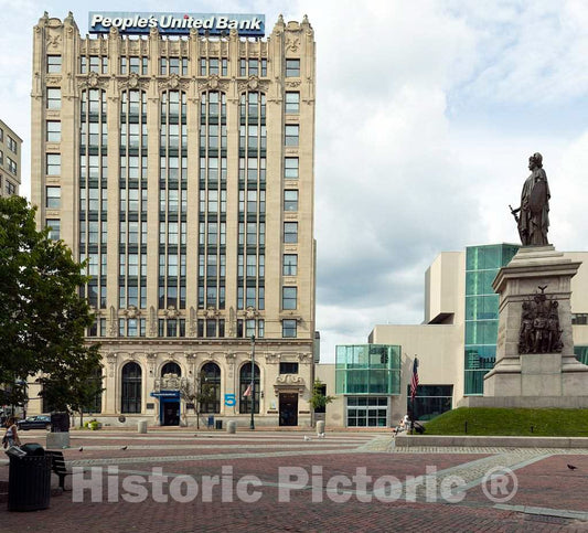 Photograph- Franklin Simmons's Portland Soldiers and Sailors Monument was built in 1891 in Portland, Maine's, Monument Square, now home to the city's main public library (right background)