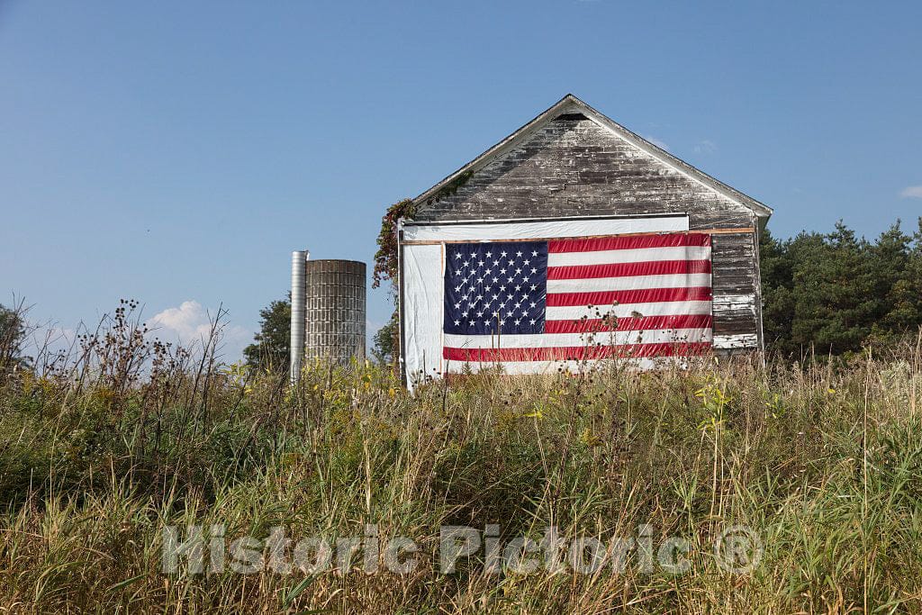 Photo - Old barn with a New American Flag Outside New Haven, Vermont- Fine Art Photo Reporduction