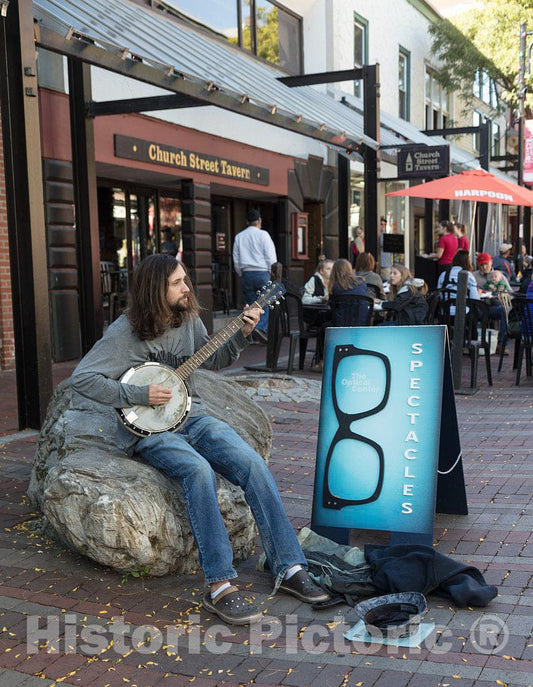 Photo - Street musician in the Burlington Marketplace, a blocks-long pedestrians-only shopping and entertainment street in downtown Burlington, Vermont- Fine Art Photo Reporduction