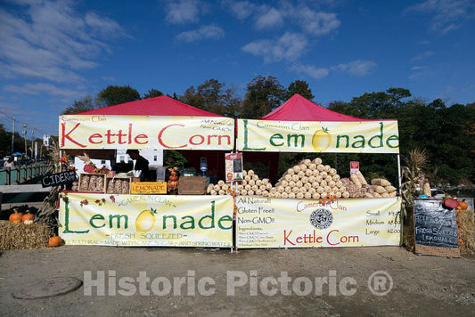 Photo- Tent purveying The Kinds of Sweet and Salty Treats Often seen at State fairs. But This one is at The Annual Pumpkinfest, a Colorful Fall Festival in Damariscotta, Maine