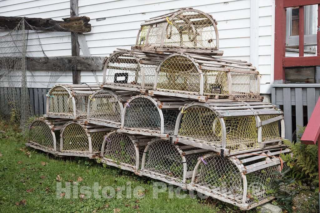 Photo - Lobster (or lobsta, as Mainers Pronounce it) Traps Beside The Palabra, a Gift Shop in The Fishing and lobstering Port of Boothbay Harbor, Maine
