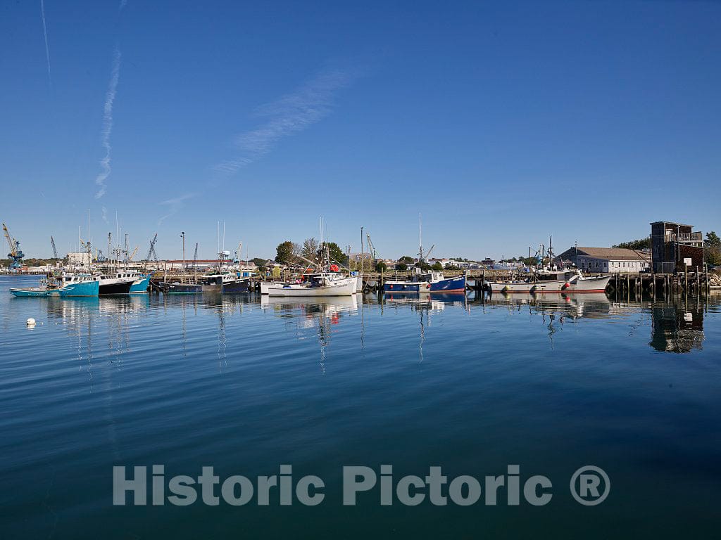 Photo- Part of Portsmouth, New Hampshire's harbor on the Piscataqua River. In the distance is a portion of the Portsmouth Naval Shipyard, which is in Kittery, Maine 1