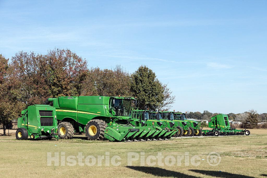 Photo - A Row of Farm Machines Ready for Sale Outside a dealership in Batesville, Mississippi- Fine Art Photo Reporduction