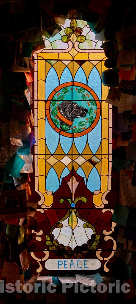 Photo- Each dog-themed stained-glass window has a theme (see its title) at the Dog Chapel, indeed, a quite serious chapel devoted to departed and/or beloved canine pets 1
