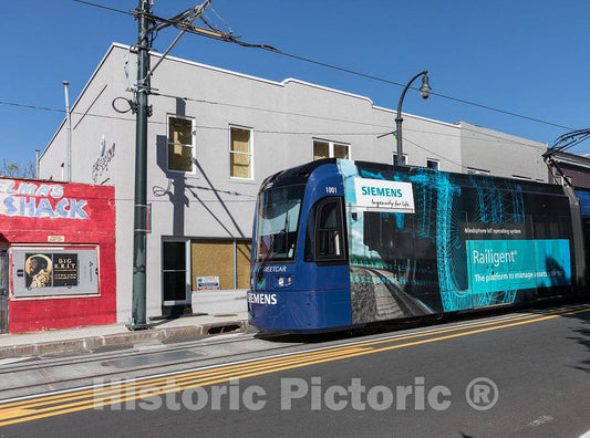 Photo - A Multi-car Atlanta Streetcar Runs Along a Downtown Loop in The Georgia Capital City Better Known for its congested auto and Truck Traffic- Fine Art Photo Reporduction