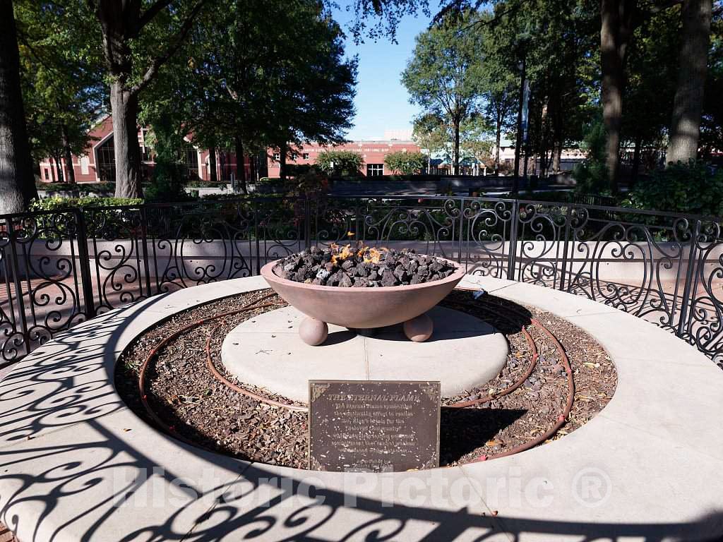 Photo- The"eternal flame" at the gravesite of civil-rights leader Martin Luther King, Jr, at the King Center in Atlanta, the capital and largest city in the U.S. state of Georgia