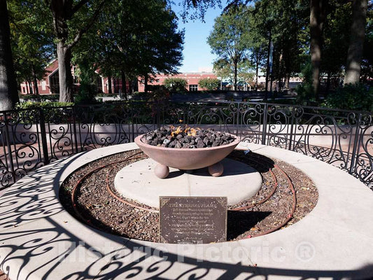 Photo- The"eternal flame" at the gravesite of civil-rights leader Martin Luther King, Jr, at the King Center in Atlanta, the capital and largest city in the U.S. state of Georgia