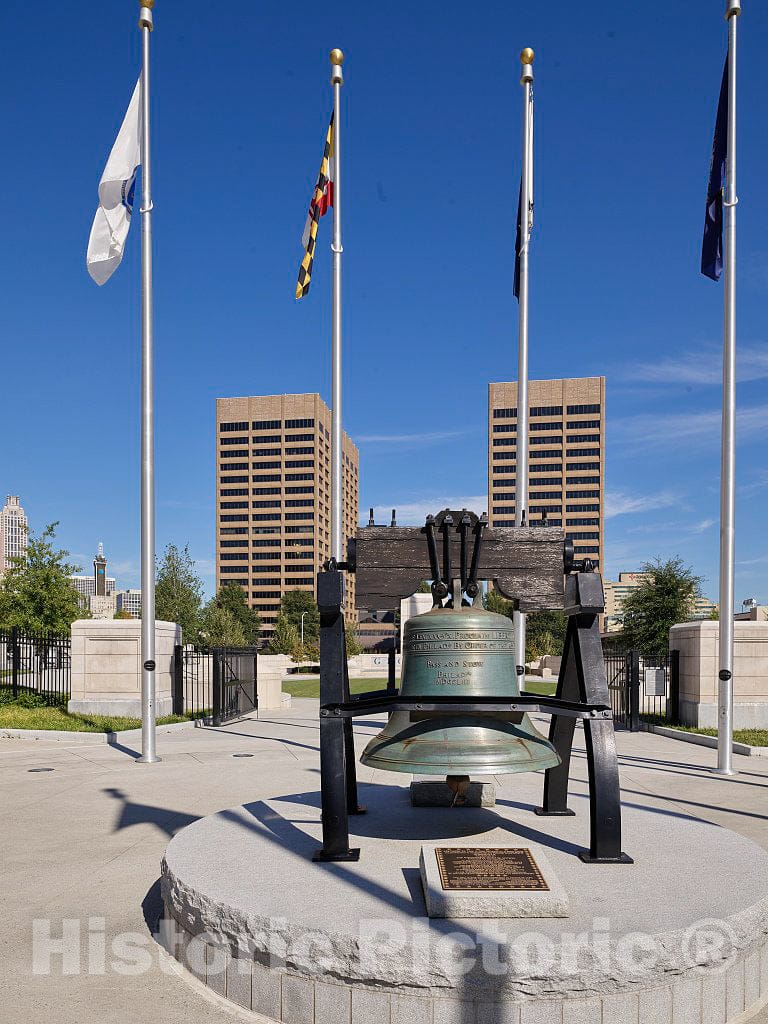 Photograph- A replica of the Liberty Bell, an iconic symbol of American independence, located in Philadelphia, Pennsylvania, relocated from the Georgia State Capitol grounds to Library Plaza