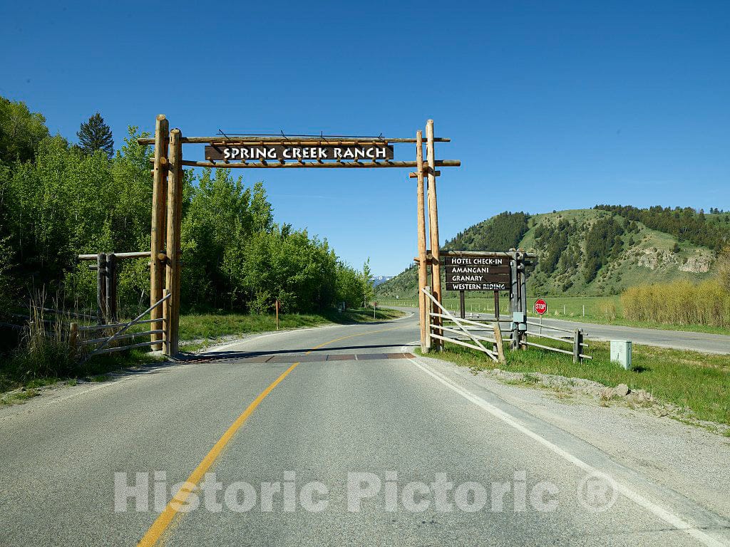 Photo- Entrance gate at Spring Creek Resort Ranch on The Edge of Grand Teton National Park and a Wildlife Reserve Beneath The Teton Mountain Range in Jackson Hole, Wyoming