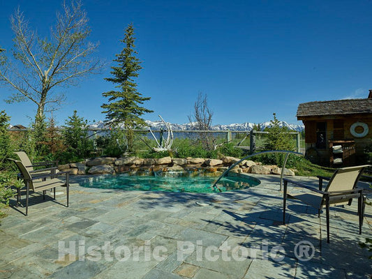 Photograph - Pool setting outside a guest cabin at Spring Creek resort ranch on the edge of Grand Teton National Park and a wildlife reserve beneath the Teton Mountain Range in Jackson Hole 1
