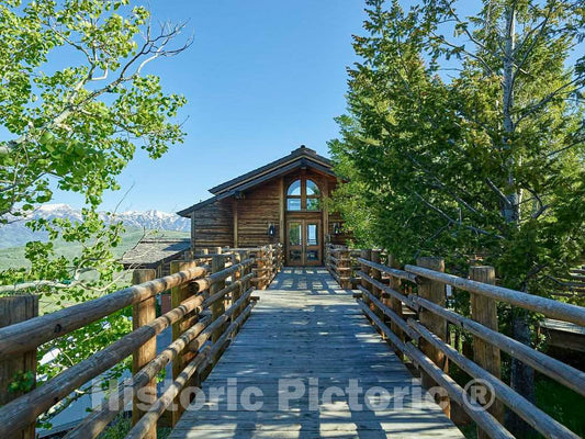 Photo- Guest cabin at Spring Creek resort ranch on the edge of Grand Teton National Park and a wildlife reserve beneath the Teton Mountain Range in Jackson Hole, Wyoming 2