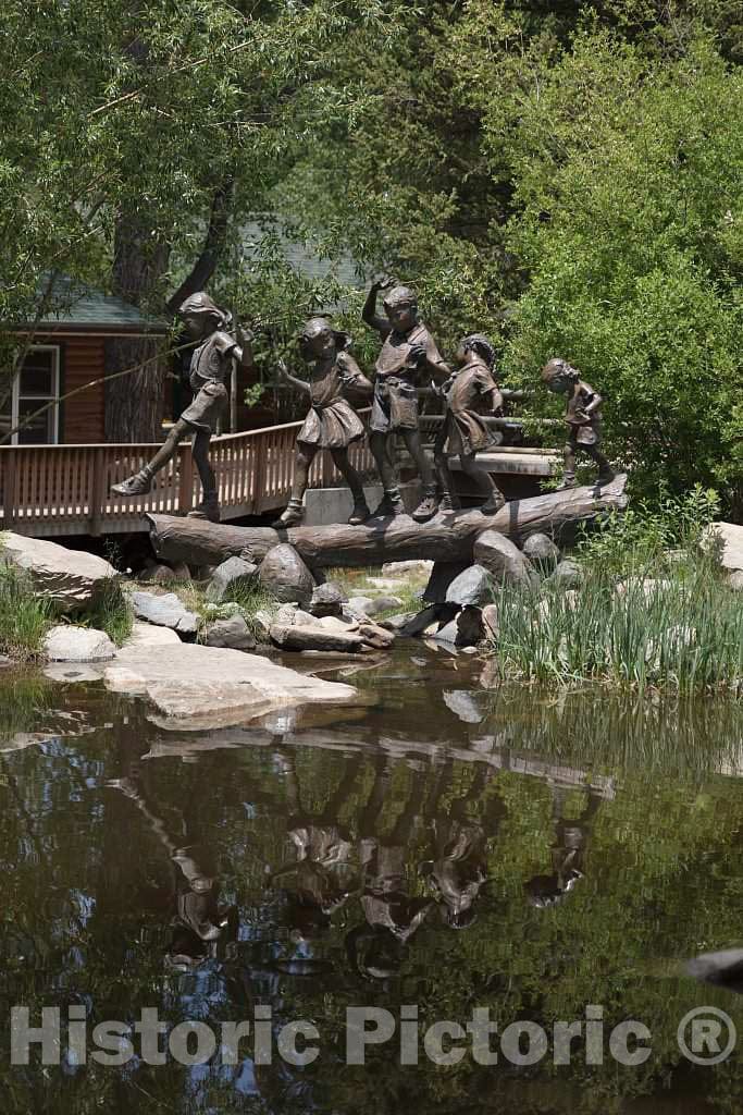 Photo- Brass Children, Part of The Charlie Gates Sculpture Garden at The A Bar A Guest Ranch Near Riverside, Wyoming, Play at a Small Creek That Runs Past The ranch's Cabins