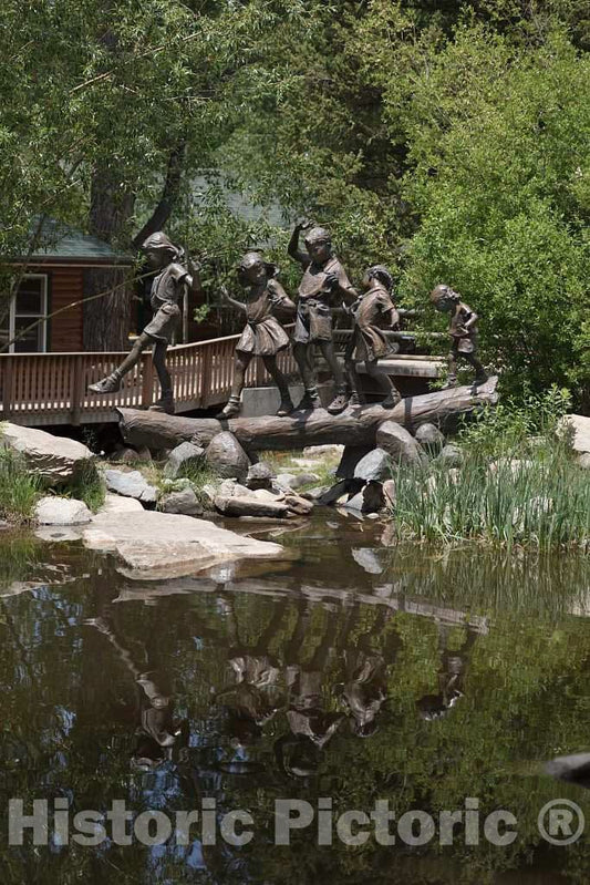 Photo- Brass Children, Part of The Charlie Gates Sculpture Garden at The A Bar A Guest Ranch Near Riverside, Wyoming, Play at a Small Creek That Runs Past The ranch's Cabins