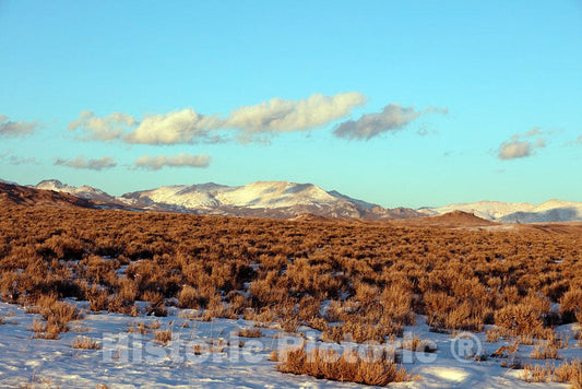 Photo- There's a respite this day in the onslaught of deadly blizzards and snow accumulations measured in feet experienced on many a winter's day in rugged and remote Fremont County