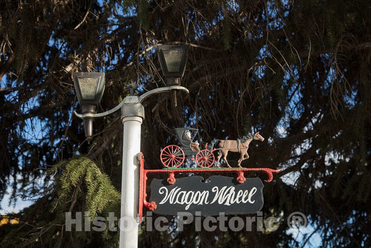 Photo - Sign (Wagon Wheel) for one of The Cottages at Big Creek Ranch, a Carbon County, Wyoming, Cattle Ranch Near The Colorado Border- Fine Art Photo Reporduction