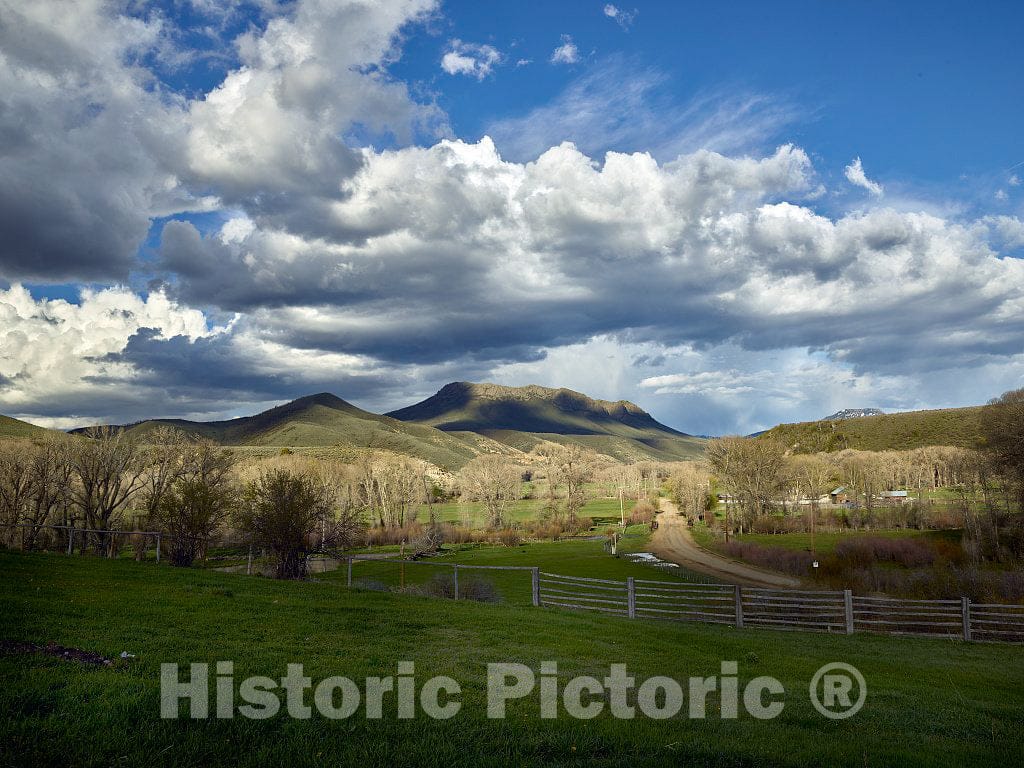 Photo- The Distant Squaw Mountain Looms Over The Ladder Livestock Ranch Near The Tiny Town of Savery, Wyoming, Across The Highway from which Lie Colorado and The Mountain