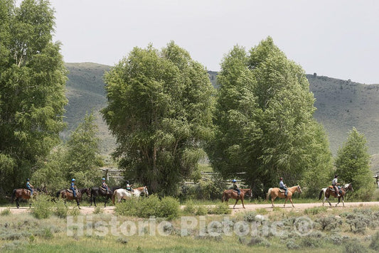 Photo - Horseback riders at the A Bar A guest ranch, just over the Colorado border near Riverside in Carbon County, Wyoming- Fine Art Photo Reporduction