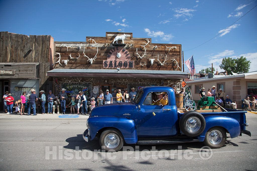 Photo - A Truck Passes The White Wolf Saloon in Douglas, Wyoming During The Wyoming State Fair's Annual Kickoff Parade- Fine Art Photo Reporduction