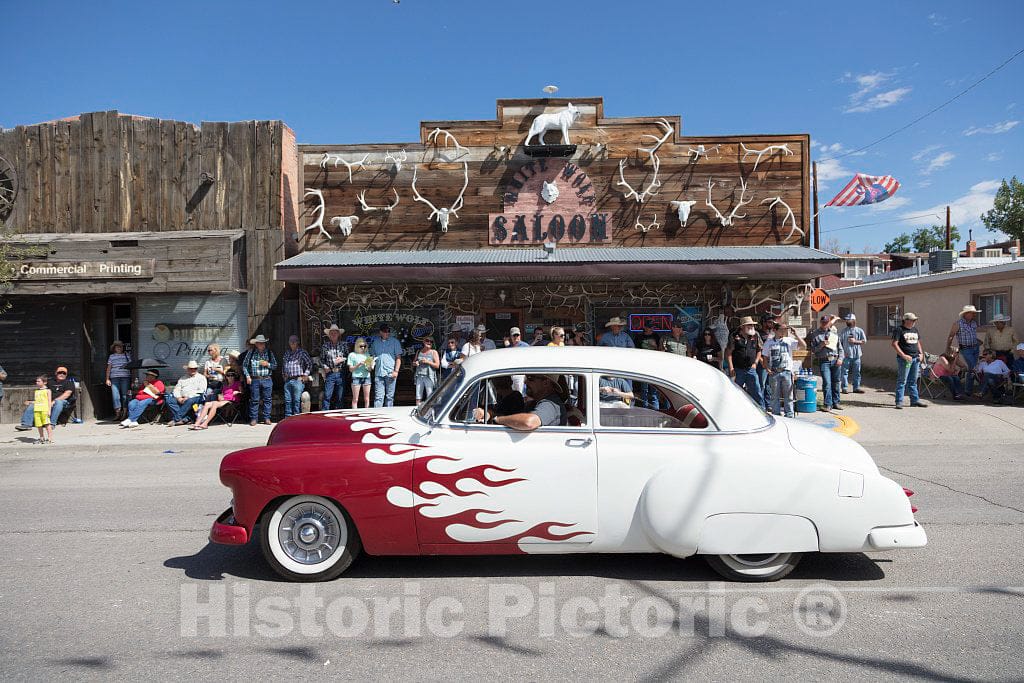 Photo- A Vintage car Passes The White Wolf Saloon in Douglas, Wyoming During The Wyoming State Fair's Annual Kickoff Parade 2 Fine Art Photo Reproduction