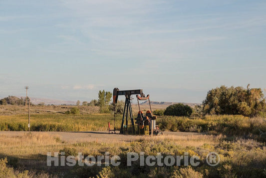 Photo - A pumpjack Oil Drill Outside The Little Town of Frannie, which straddles The line Between Park and Big Horn Counties in Northwestern Wyoming- Fine Art Photo Reporduction