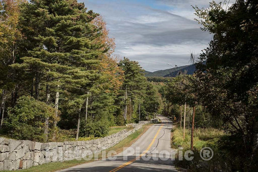 Photo - A stone wall,known locally as the Great Wall of Sandwich, runs along a pond road near Sandwich, New Hampshire- Fine Art Photo Reporduction