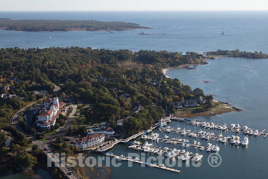 Photo - Aerial View of The Harbor and Boat Docks in New Castle, New Hampshire. The Large Building with a red roof is The Wentworth-by-The-Sea Resort Hotel