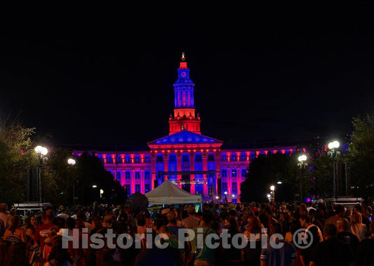 Photograph - In preparation for the Fourth of July, or American Independence Day, fireworks that light up the sky over Denver, Colorado's, downtown Civic Center is bathed in colored lights 2
