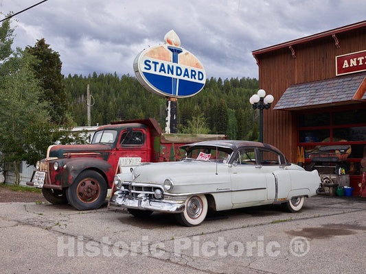 Photo - Vintage car, Truck, and Other Stuff at The Battle Mountain Trading Post, an Antiques and Collectibles Store in Minturn, Colorado- Fine Art Photo Reporduction