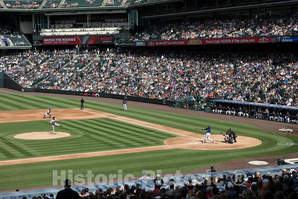 Photo - The Colorado Rockies' Cristhian Adames Takes a Swing at Coors Field, Home of The Rockies Major-League Baseball Team in Denver, Colorado- Fine Art Photo Reporduction